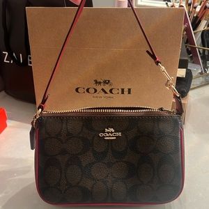 Coach Nolita 19 in Signature Canvas purse 
RM320